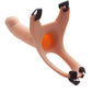 A silicone curved dildo with an attached harness. The dildo is flesh-colored, and the harness is black with adjustable straps.